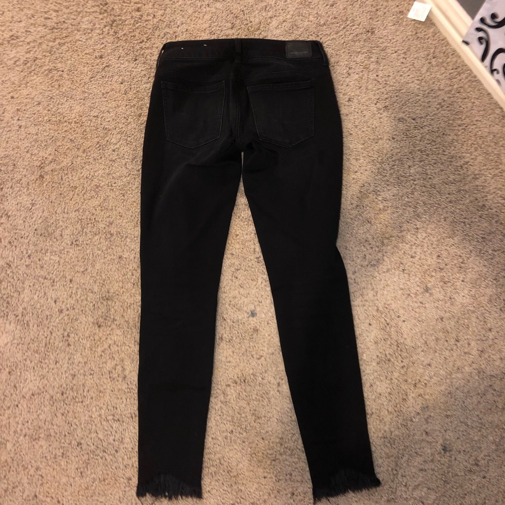 Black fringe jeans with holes